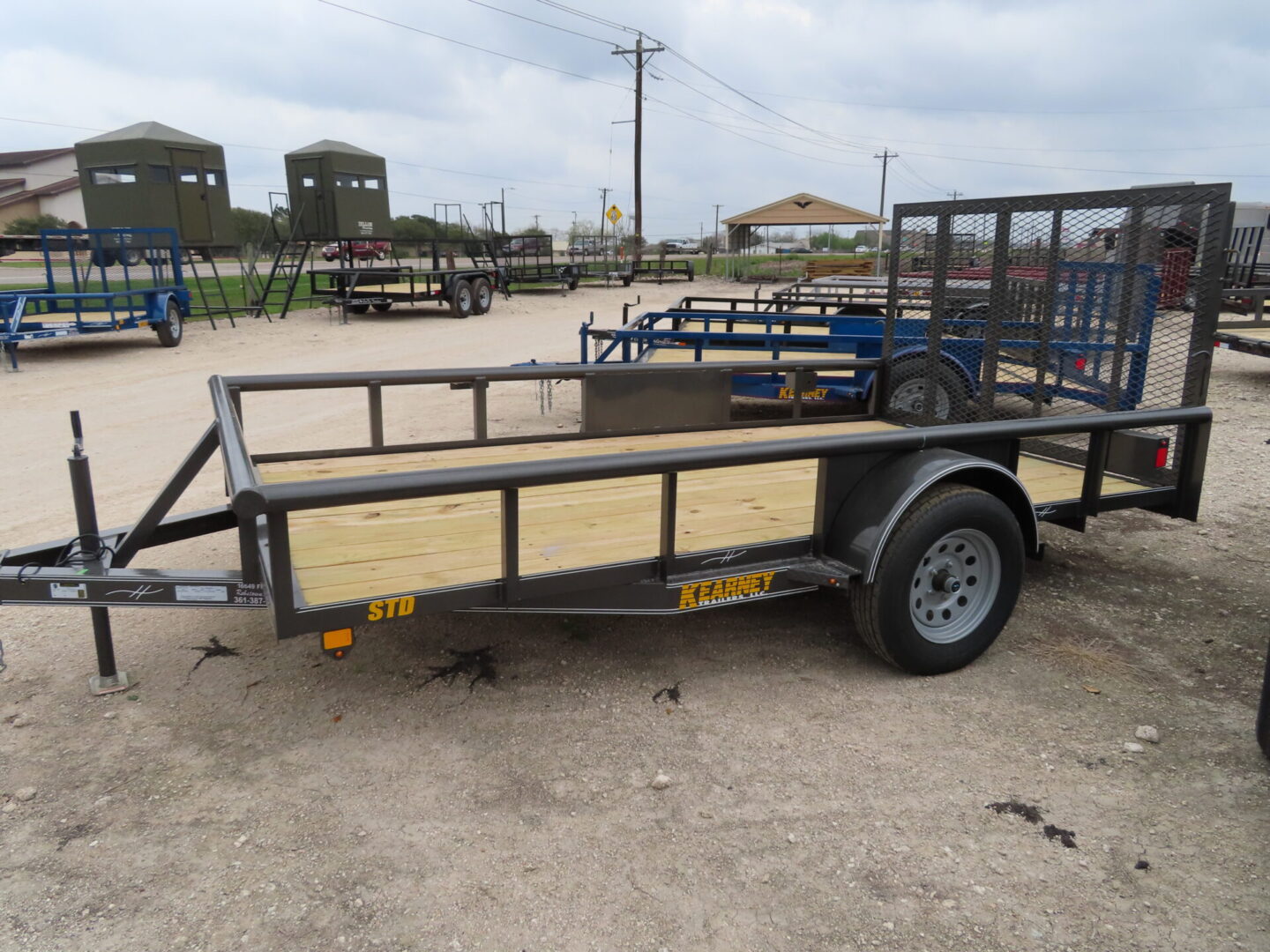 Tandem axle utility trailer for hauling at McWha Fischer