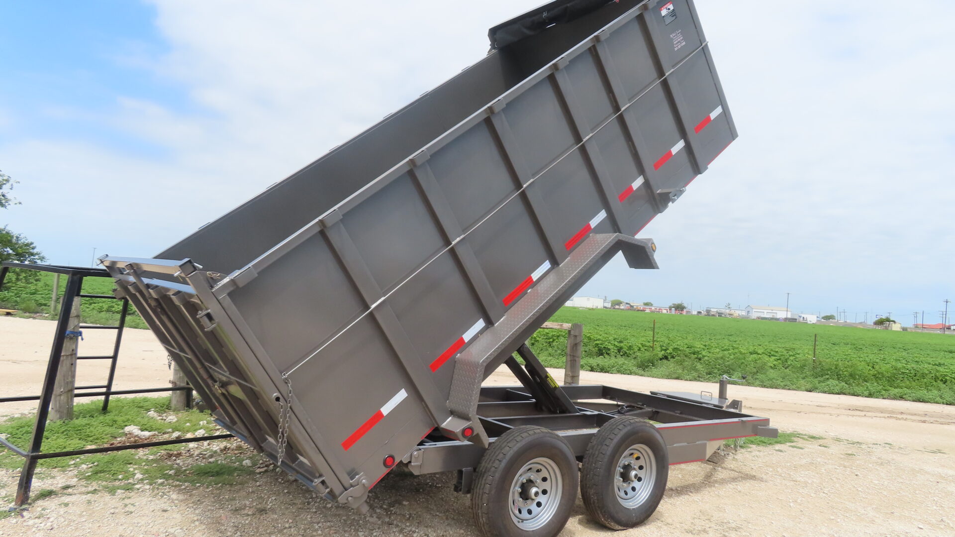 Dump trailer with hydraulic lift at McWha Fischer
